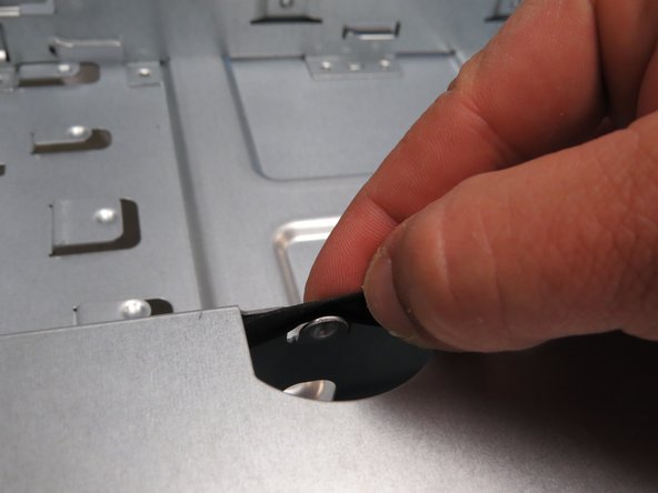Release the LED cable from the remaining cable management brackets within the HDD cage.