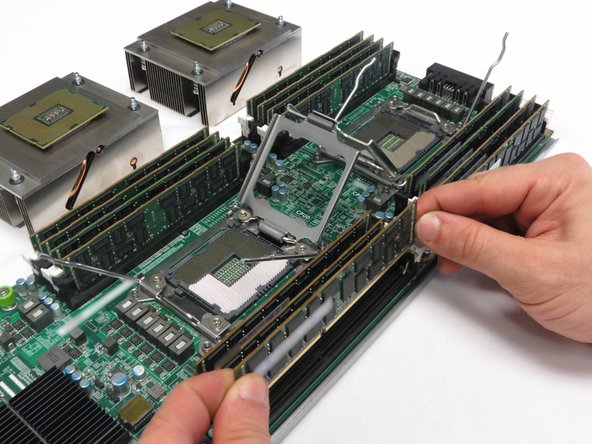 Make sure the DIMM pins do not contact any surface.