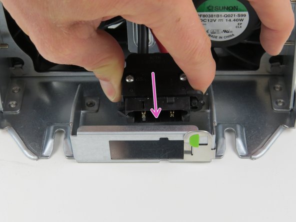Insert the power connector into the slide-to-lock panel.