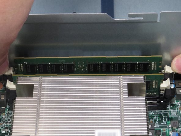 Lift DIMM from its channel, as shown.