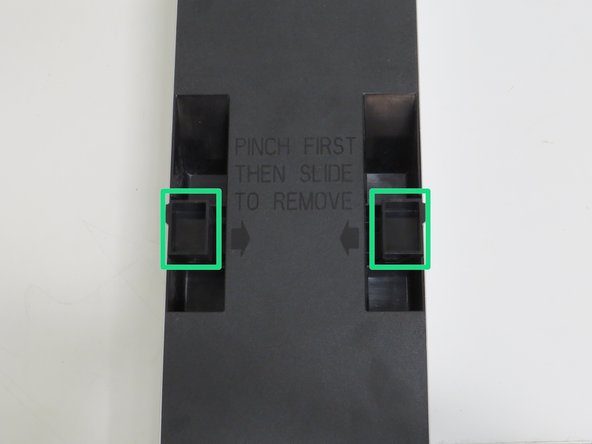 Squeeze (2) lid retention handles towards the center of the node.