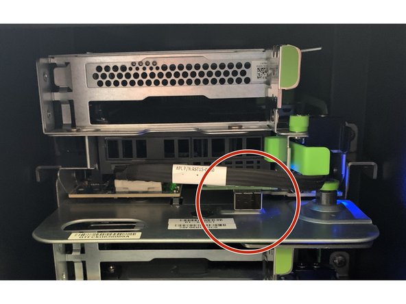 Carefully insert the 10G SFP+ cable into the NIC (Network Interface Controller) port, ensuring it locks into place.