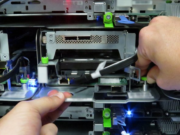 Grasp the server as shown.