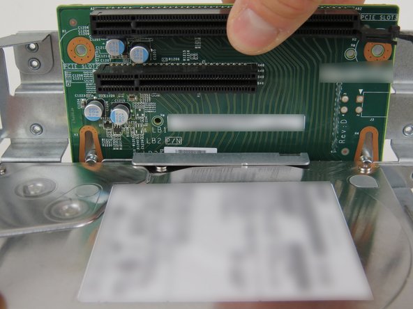 Remove the failed riser card.