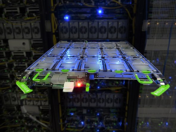 Push the storage tray back into the Open Vault chassis.