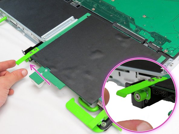 Loosen one thumbscrew.