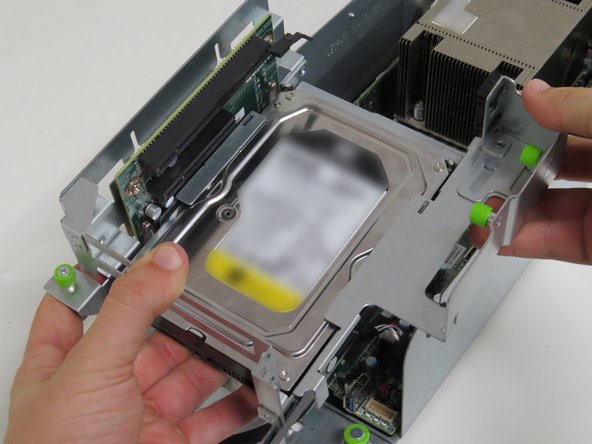 Install the riser card assembly into the server.