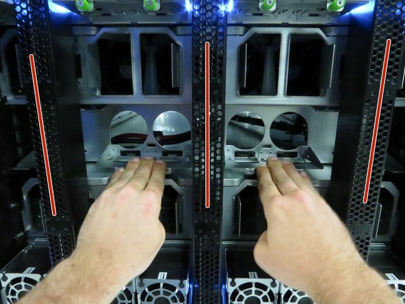 Push the storage chassis about 5cm from the rear of the rack.