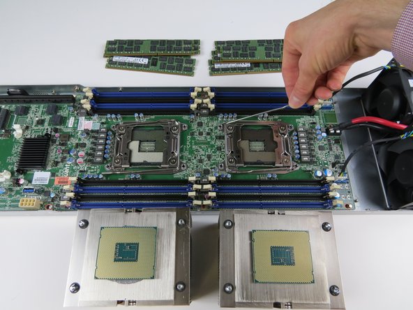 Close (2) CPU retention brackets.