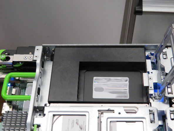 Pivot the HDD locking gate until it rests in a vertical position.