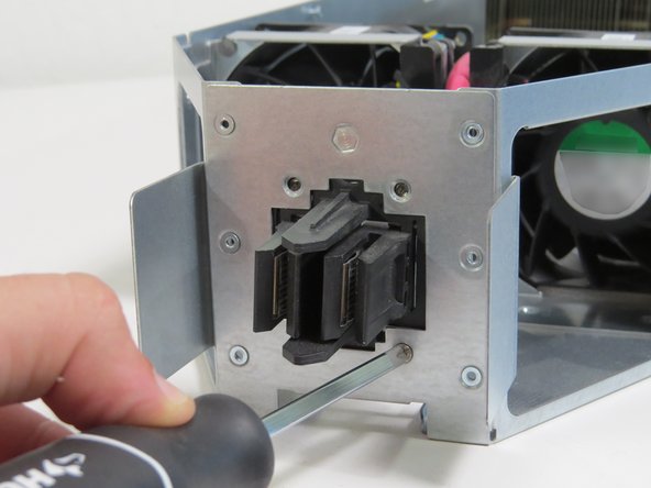 Screw in (4) Phillips #1 screws to secure the bus lead clip.