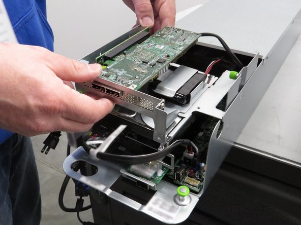 Install the riser cage.