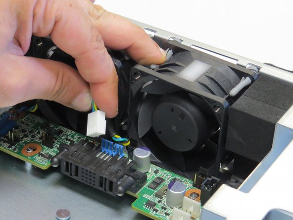 Disconnect the fan power cable.