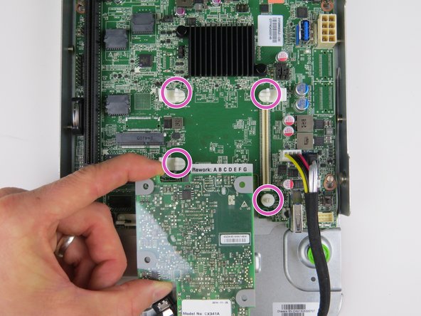 Align the NIC onto (4) the nylon standoffs.