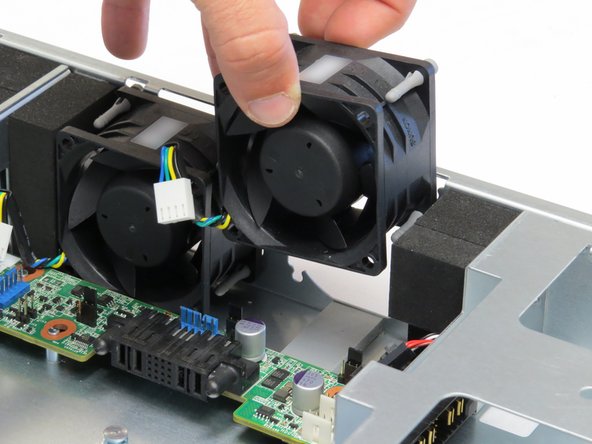 Place new fan in the chassis.