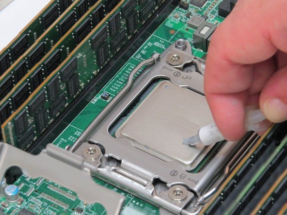 Carefully lower the CPU into its socket.