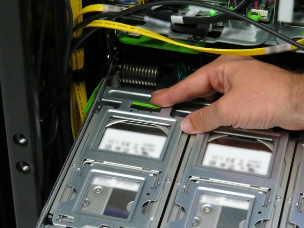 Close and secure the hard disk drive cages.