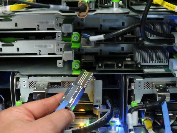 Connect the Mini-SAS cable to the storage tray.