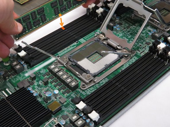 Align the DIMM pins with its socket key.