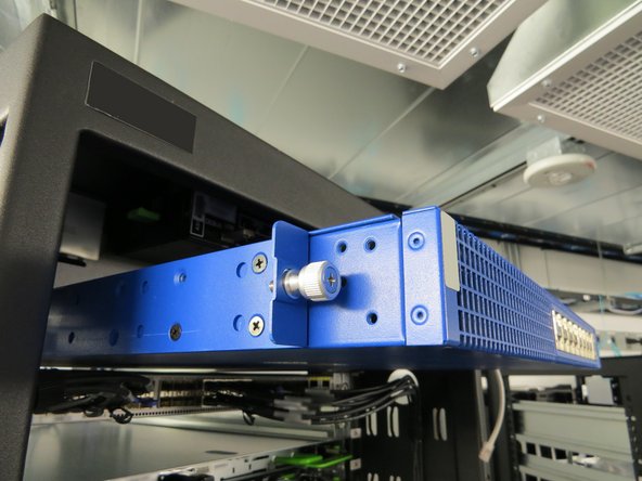 The Wedge mounting brackets are placed about 51mm (fifty one millimeters) back from the front of the switch to provide clearance during power supply unit (PSU) removal.