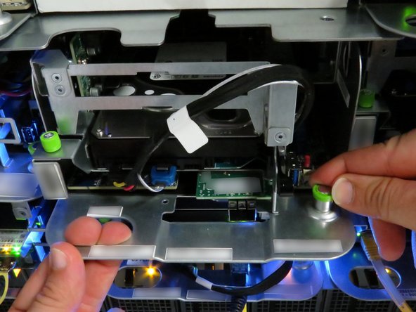 Pull the server until about (2) inches of the black lid is exposed.