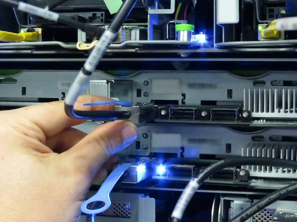 Connect the Mini-SAS cable.