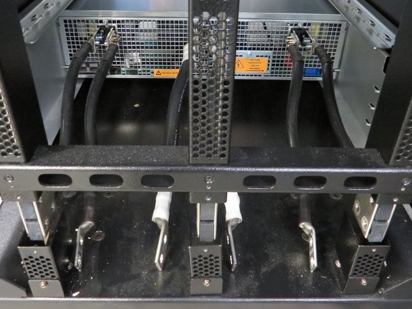 Make sure there is not live power on the bus bars before proceeding with this step.