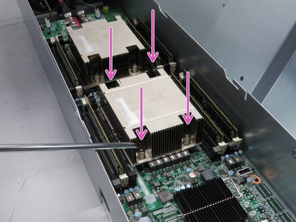 The heatsink may be hot. Take care when handling the CPU heatsink.