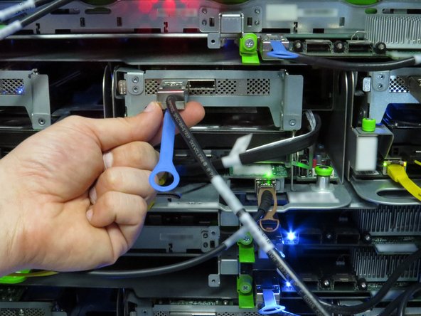 Connect the Mini-SAS cable to the RAID controller.