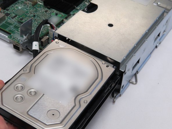 Pull the HDD away from the chassis.
