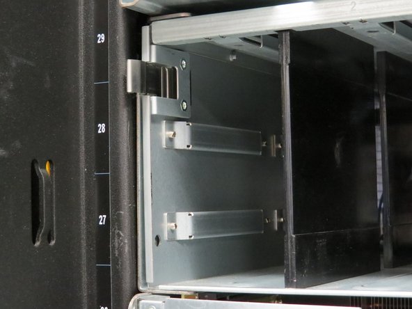 These are safety screws to secure the power shelf. There are two safety screws in total.