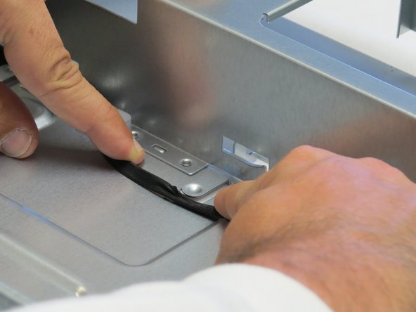 Slide the LED cable away each cable management tab in the chassis.