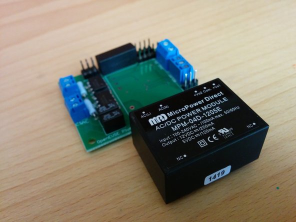 Solder the AC to DC converter to the OpenEVSE board.