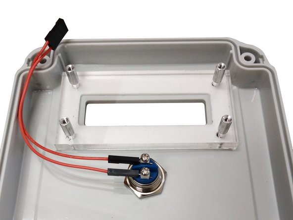 Connect harness to the screw terminals of the push button.