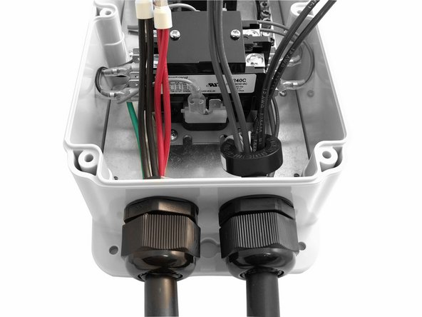 Insert Input cable through the cable gland on the Left and tighten.