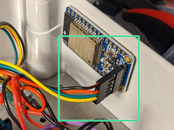 Peel the red backing on the 3M VHB industrial mounting tape.