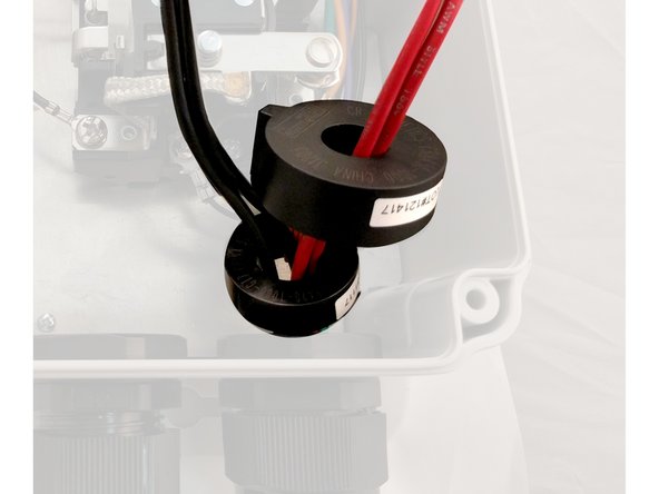 Thread ALL hot and neutral lines through the 4 wire GFCI coil with the orange self test loop.