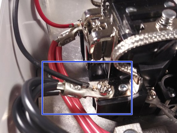 Screw the ring terminal on the EV cable power conductor to the top position of relay along with the red wire on the wiring harness.