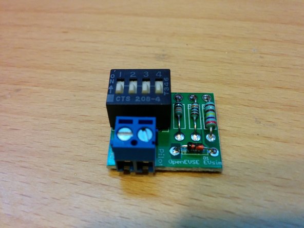 Solder the screw terminal to the board with the openings for the wire facing out.