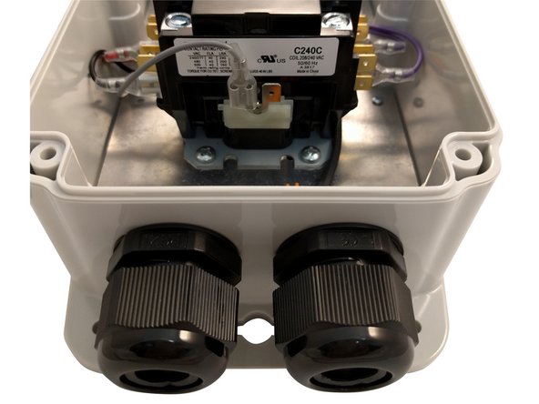 Install cable glands on the enclosure with seals on the outside.