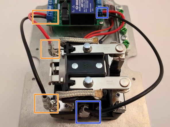 Struthers &amp; Dunn - Connect DC relay coil (top) with a red wire to OpenEVSE controller Relay 1/2 Common. Connect relay coil (bottom)  with a black wire to Relay 2.