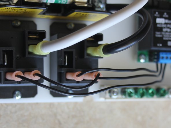 Crimp 22AWG wire to pink QC connectors. Connect to Fuse block QC terminals.
