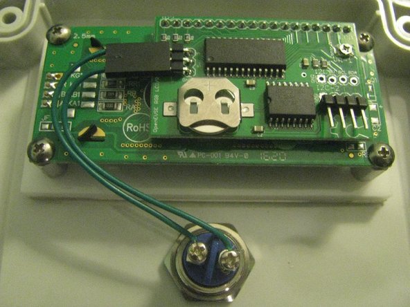 Connect the power cable to a 120V power source. Verify that the LCD panel lights up, and is readable. Adjust the trimpot on the LCD board if necessary.