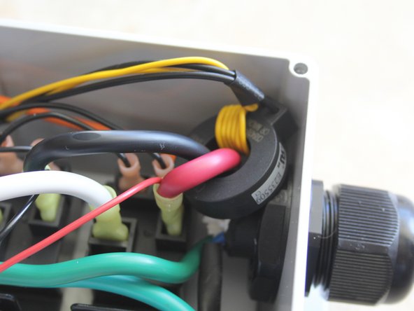 Run both HOT lines through the GFCI coil.