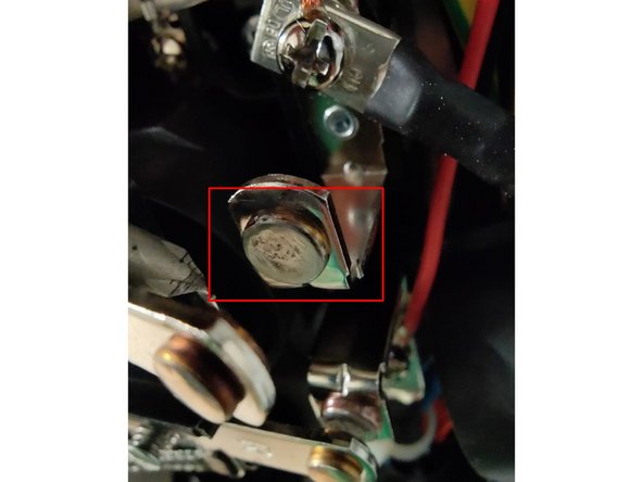 Cut a piece of coarse emery cloth roughly 3x the width of the contact (normal sandpaper is not recommended as it can leave deposits of other metal types on the contact surface)