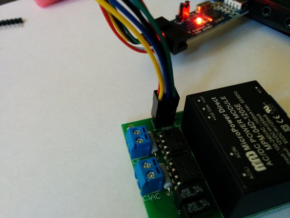 Connect Programmer to OpenEVSE then connect to USB port on PC.