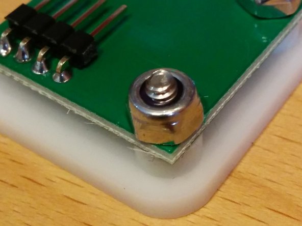 Mount the LED logic board to the laser cut plate with the LED facing down so the LED will shine through the plate.