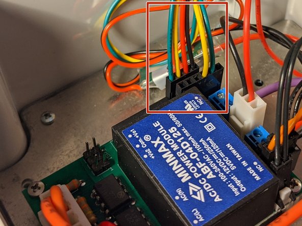 Install the WiFi module with the antenna in the top of the enclosure and the connector facing down.