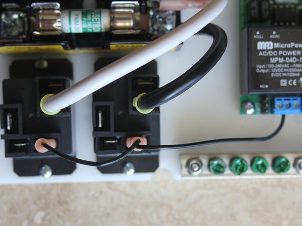 Crimp 22AWG wire to pink QC connectors. Connect to Fuse block QC terminals.