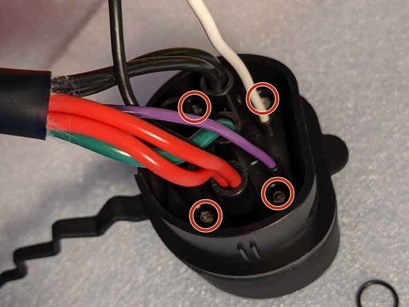 Insert pins into the connector housing.